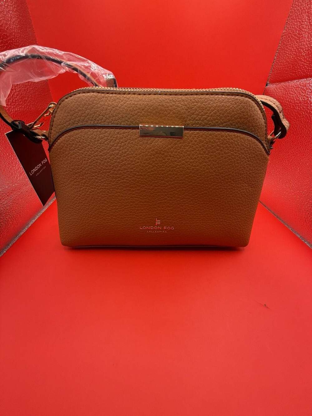 London Fog Evelyn Dome Crossbody Bag Cognac